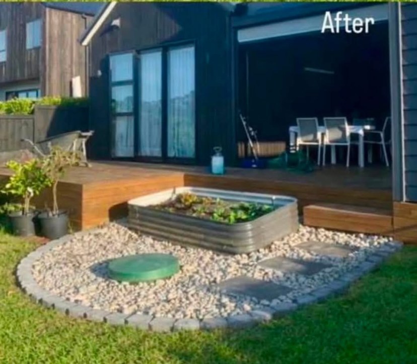 Lawn area transformed into a stone garden bed with edging — after