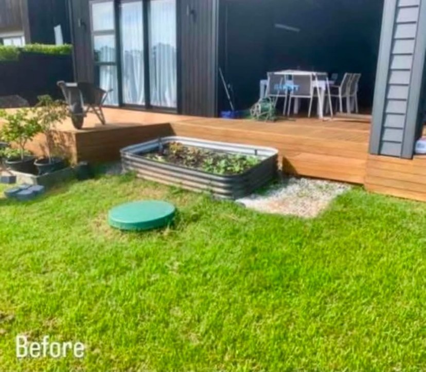 Lawn area transformed into a stone garden bed with edging — before